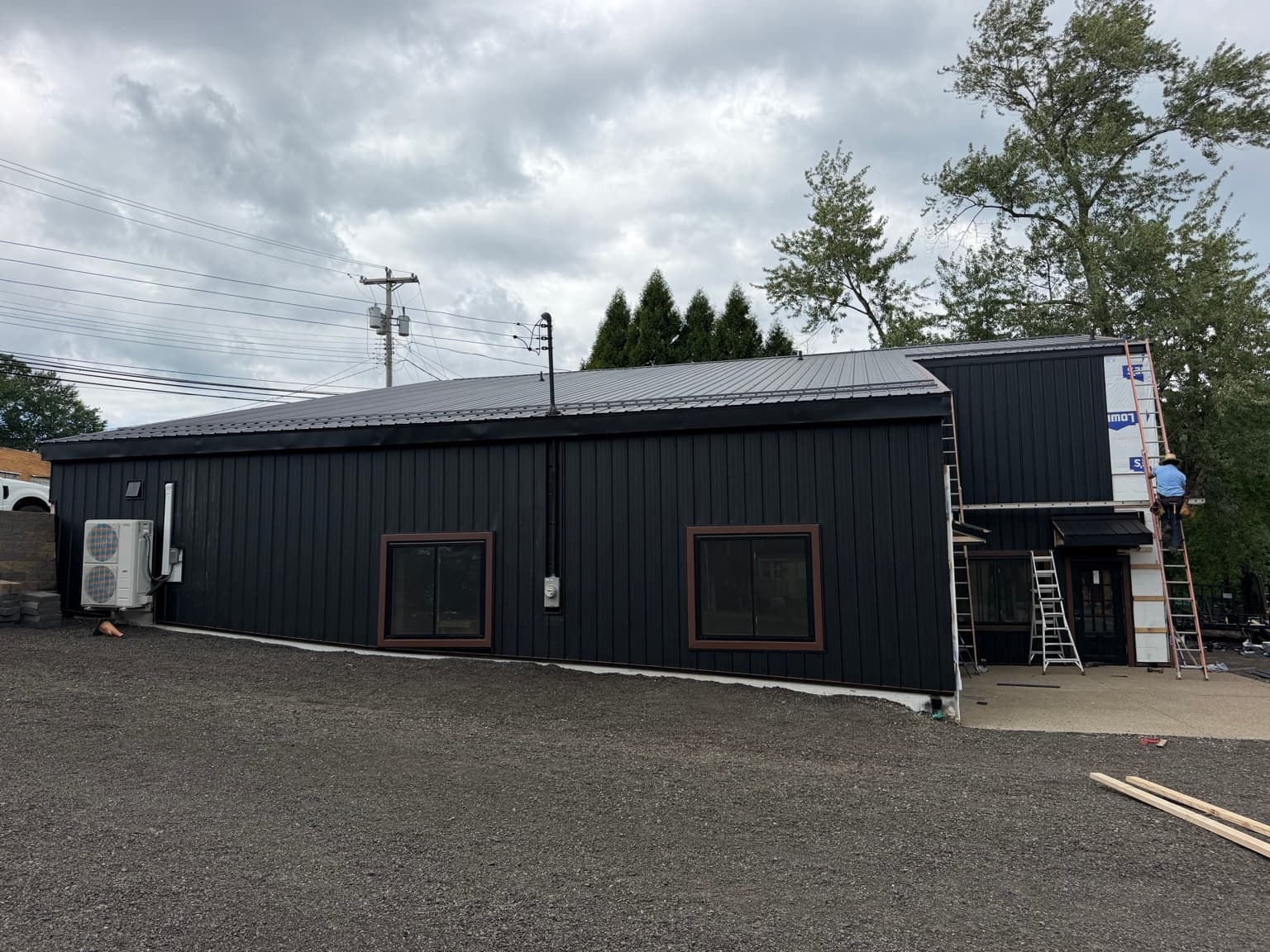 Near-complete coordinated metal roofing and siding